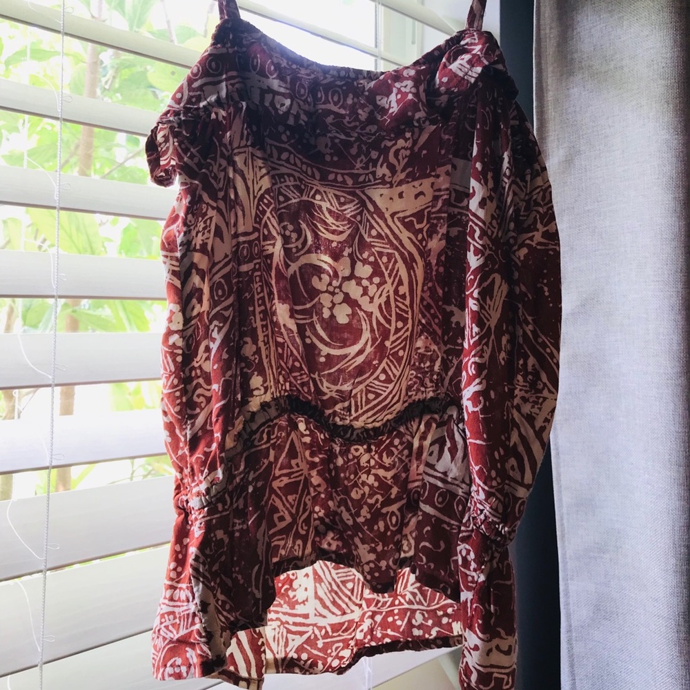 Burnt orange colored blouse